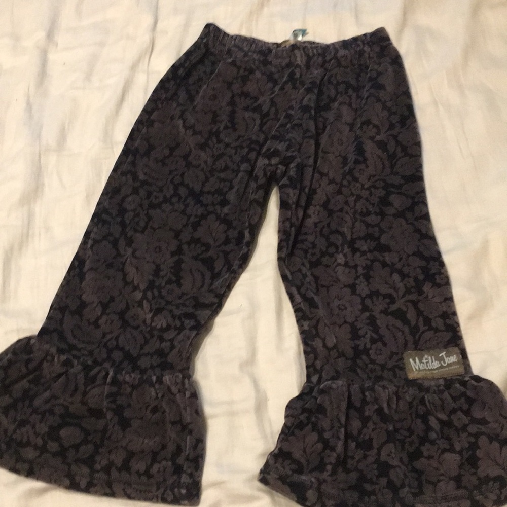Stretch velvet flare pants.